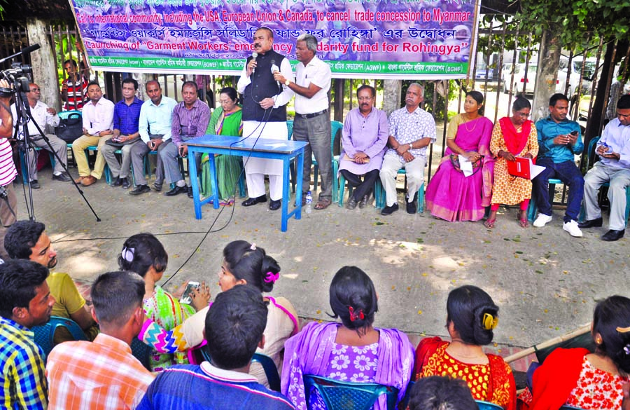 Minister for Shipping Shajahan Khan speaking as Chief Guest at a gathering of garments workers in front of Jatiya Press Club yesterday demanding sanctions on Myanmar by USA , European Union and Canada.
