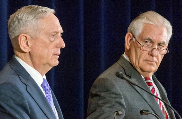 US Secretary of Defense Jim Mattis(L) and US Secretary of State Rex Tillerson conduct a press conference at the US Department of State in Washington, DC.