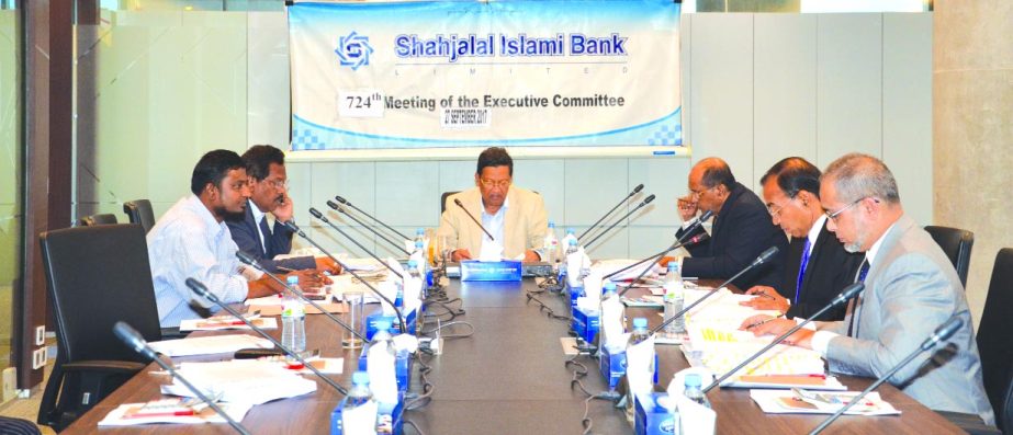 Akkas Uddin Mollah, EC Chairman of Shahjalal Islami Bank Limited, presiding over its 724th meeting at the bank's head office in the city recently. Engineer Md. Towhidur Rahman, Mohammed Younus, Khandaker Sakib Ahmed, Directors of the bank among others we