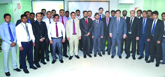 Md. Shafiul Azam, Managing Director of Modhumoti Bank Limited, poses with the participants of a day-long training program on "Work Order Finance" was held at Modhumoti Bank Training Institute recently. Kazi Ahsan Khalil, Deputy Managing Director of the