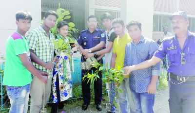 DINAJPUR(South): Md Sheikh Nasim Habib , Officer-in- Charge , Fulbari Thana receiving saplings from SSC students of batch 2017 of the Upazila on Thursday.