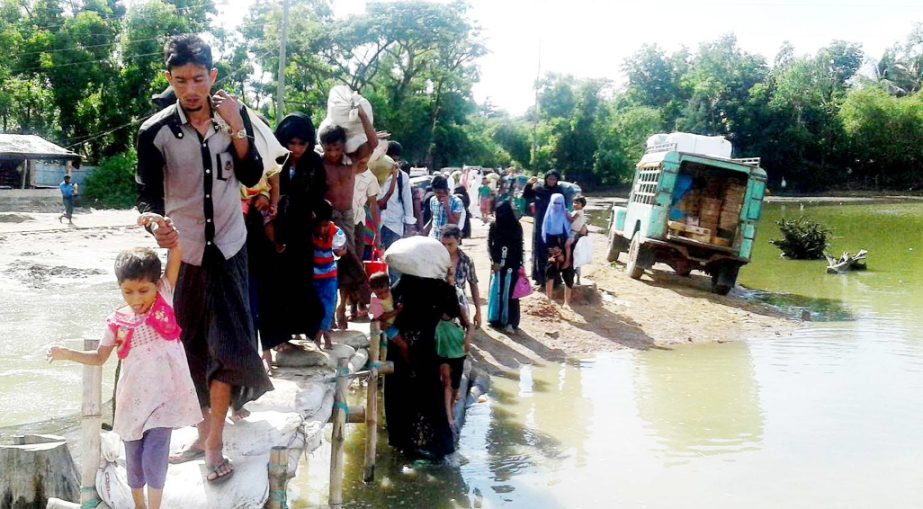 Rohingyas are still coming river-route. This snap was taken from Sabrangh Hariakhali Cyclone Centre on Thursday.