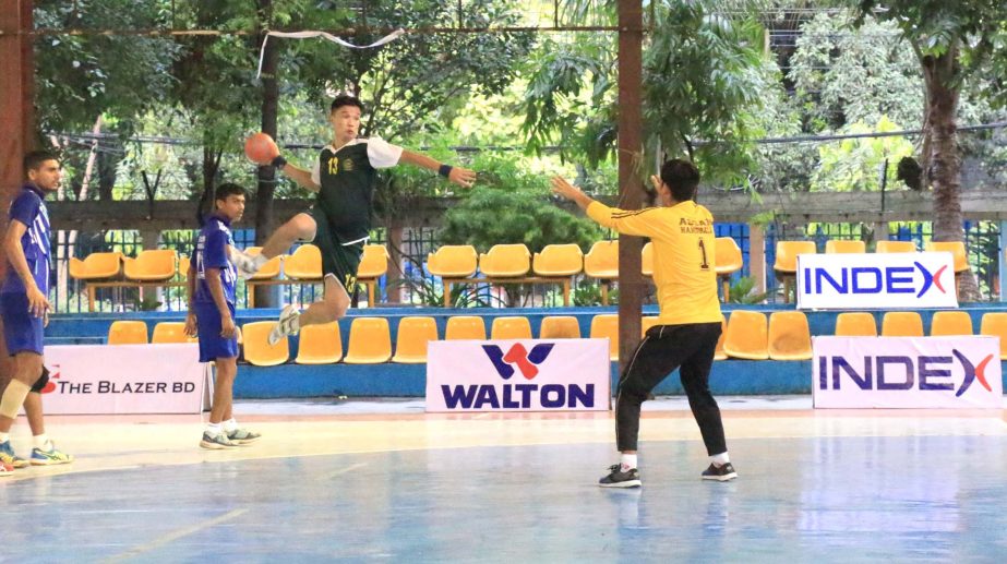 An action from the match of the Index Dhaka-Assam Friendly Handball Series between Bangladesh Police Handball team and Assam Handball team at Shaheed (Captain) M Mansur Ali National Handball Stadium on Saturday.