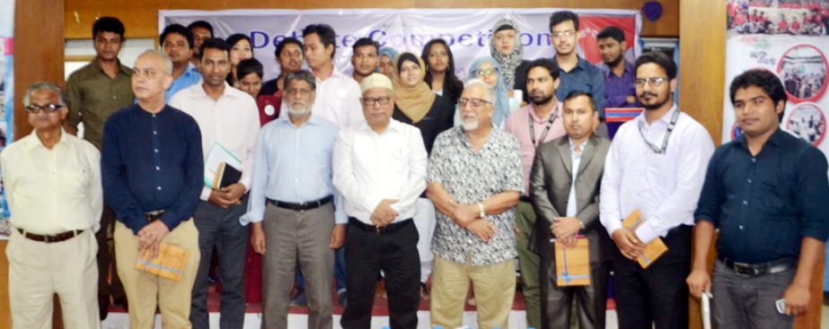 Prof Dr Anwar Hoassain, Vice-Chancellor of Northern University Bangladesh pose for a photo shoot with the participants of a debate competition over Rohingya issue held at the University campus on Thursday.
