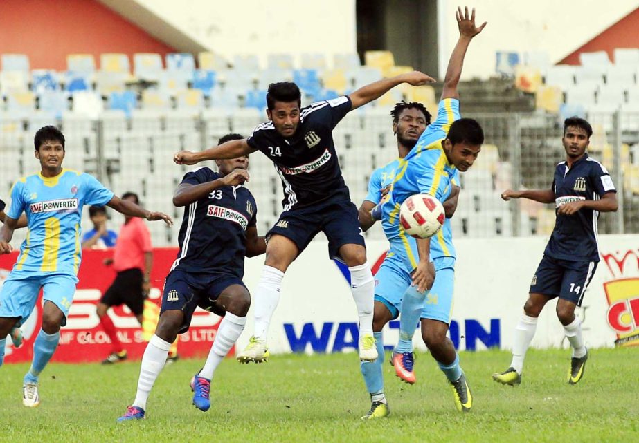 An action from the match of the Saif Power Battery Bangladesh Premier League Football between Chittagong Abahani Limited and Saif Sporting Club at the Bangabandhu National Stadium on Sunday. The match ended in a goalless draw.