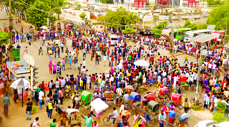 Students of DU's enlisted seven colleges blocked the road in city's Nilkhet intersection and demonstrated to press home their 5-point demands on Sunday.