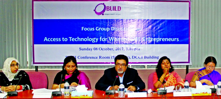 Asif Ibrahim, Adviser and Founder Chairman of Business Initiative Leading Development (BUILD) at a seminar on 'Access to Technology for Women SME Entrepreneurs' at DCCI conference room in the city on Sunday. Ferdaus Ara Begum, CEO of BUILD, Luna Shamsud