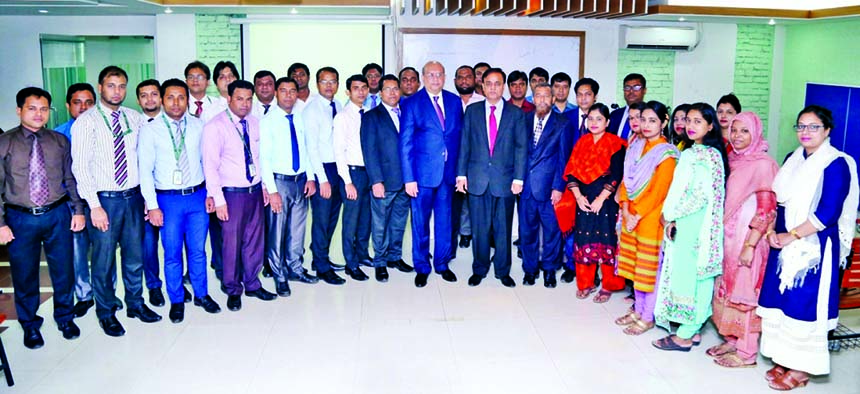 Md. Shafiul Azam, Managing Director of Modhumoti Bank Limited, poses with the participants of a workshop on "Prevention of Money Laundering and Combating Financing of Terrorism" at its Training Institute in the city on Sunday. Sk Talibur Rahman, CAMLCO,