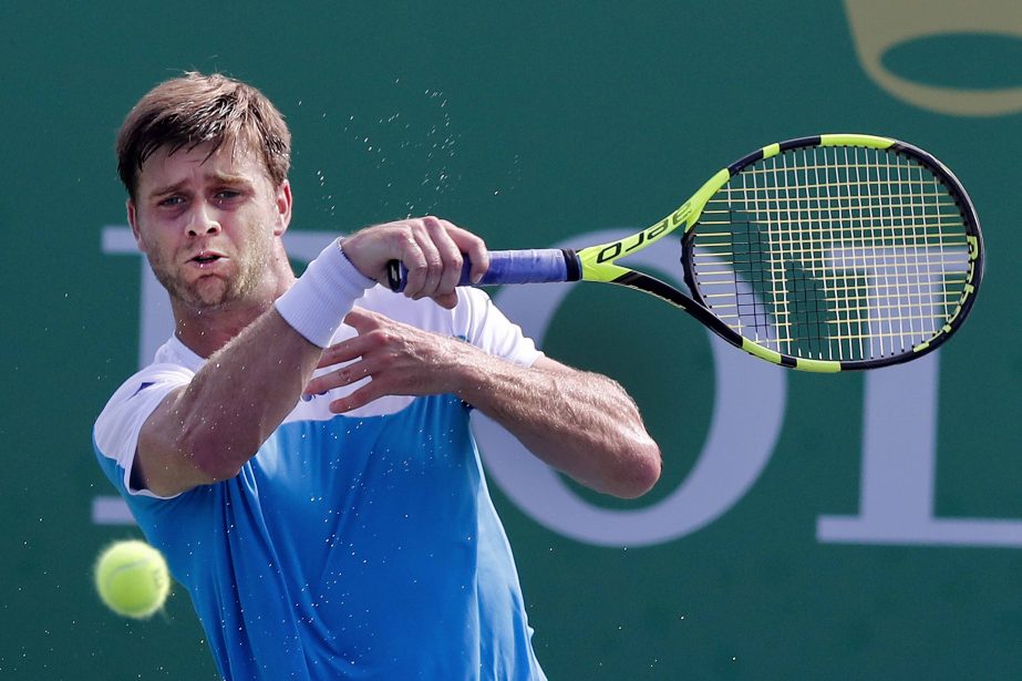 Ryan Harrison of the United States returns a shot against Zhang Ze of China during their men's singles match of the Shanghai Masters tennis tournament at Qizhong Forest Sports City Tennis Center in Shanghai, China on Tuesday.
