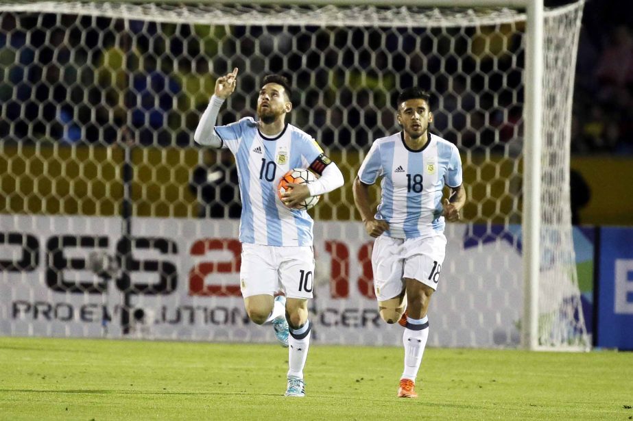 Argentina's Lionel Messi (left) celebrates after scoring against Ecuador during their 2018 World Cup qualifying soccer match at the Atahualpa Olympic Stadium in Quito, Ecuador on Tuesday.