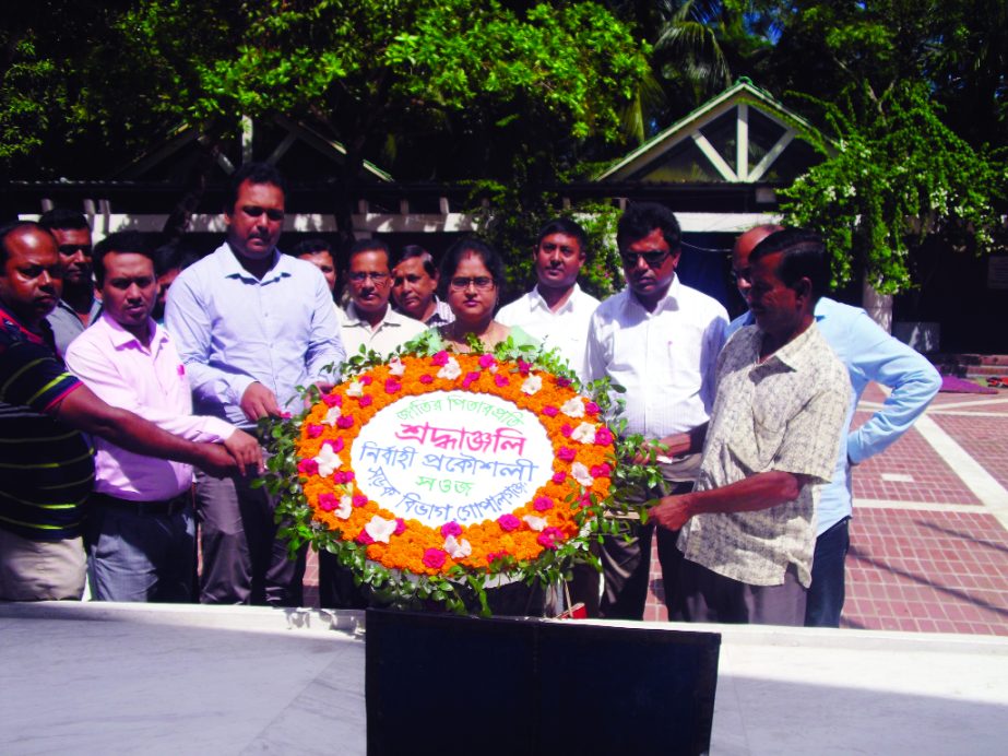 GOPALGANJ: Executive Engineer, RHB Gopalganj Mrs Taposhi Das placing wreaths at the majar of Father of the Nation Bangabandhu Sheikh Mujibur Rahman at Tungipara yesterday.