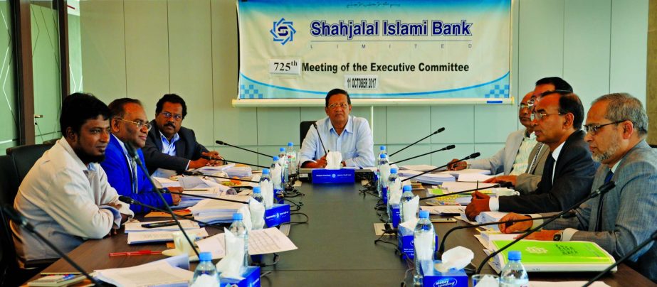 Akkas Uddin Mollah, EC Chairman of Shahjalal Islami Bank Limited, presiding over its 725th meeting at the bank's head office in the city recently. Farman R Chowdhury, Managing Director, Engineer Md. Towhidur Rahman, Anwer Hossain Khan, Mohammed Younus an