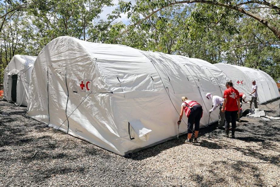 Members of Bangladesh Red Crescent Society building medical camp in Ukhiya Upazila under the initiative of the Norwegian, Finland and Japan Red Cross Society recently.