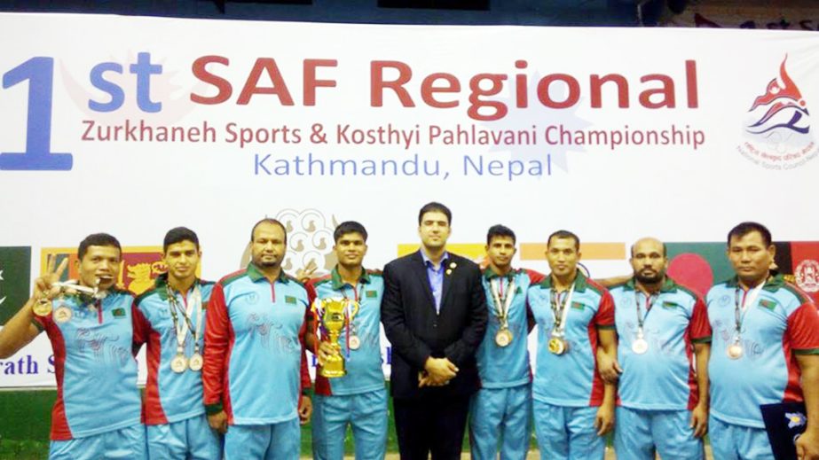 The members of Bangladesh Wrestling team, the runners-up of the SAFF Regional Wrestling Championship pose for a photo session at Kathmandu in Nepal on Saturday.