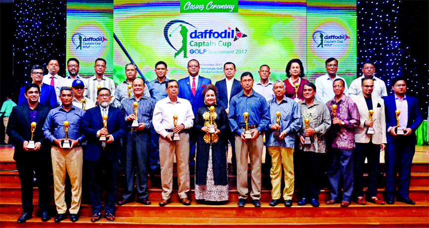 Major General A K M Abdullahil Baquee, Commandant, Defence Services Command & Staff College and Vice President, Kurmitola Golf Club, along with the winner at the Award Giving Ceremony of 'Daffodil Captain Cup Golf Tournament 2017'. Md Sabur Khan, Chair