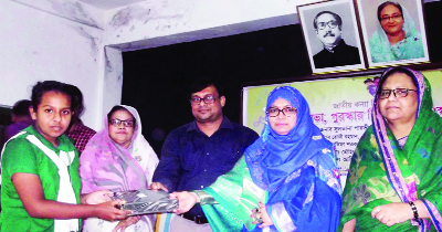 RANGPUR: Sultana Parvin, President , District Mahils Sports Association distributing prizes among the winners of different competitions arranged for girls in observance of the National Girl Child Day as Chief Guest on Sunday.