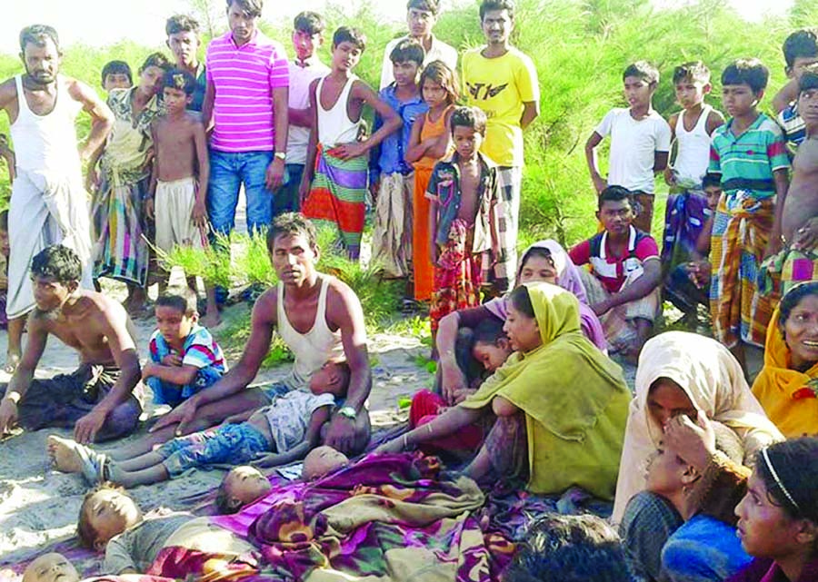 About 12 people were drowned and dozens went missing as a boat with Rohingyas fleeing to Bangladesh sank on Monday at Naf River.