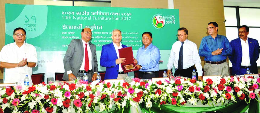 Md. Shafiul Islam, President of FBCCI, inaugurating the 5-day long 14th National Furniture Fair 2017 at a city convention centre on Tuesday. Bijoy Bhattacharya, Vice -Chairman of the Export Promotion Bureau (EPB) attends as special guest. Selim H. Rahm