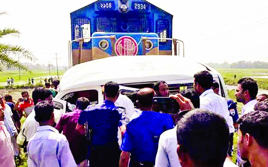 Three people were killed as a train hit a microbus in Jailkhanabari area under Bijoypur Union of Comilla Sadar Upazila on Tuesday afternoon.