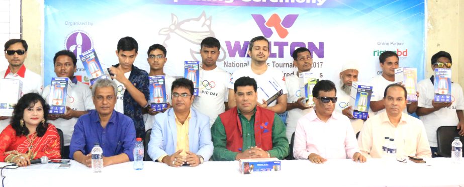 The winners of the Walton Special Chess Tournament for visually challenged chess players with the guest and officials of Bangladesh Chess Federation pose for photograph at Bangladesh Chess Federation hall-room on Wednesday.