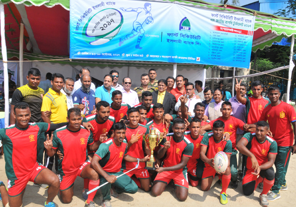 Bangladesh Army, the champions of the 7th First Security Islami Bank National Rugby Competition with the guests and officials of Bangladesh Rugby Union pose for a photo session at the Paltan Maidan on Wednesday.