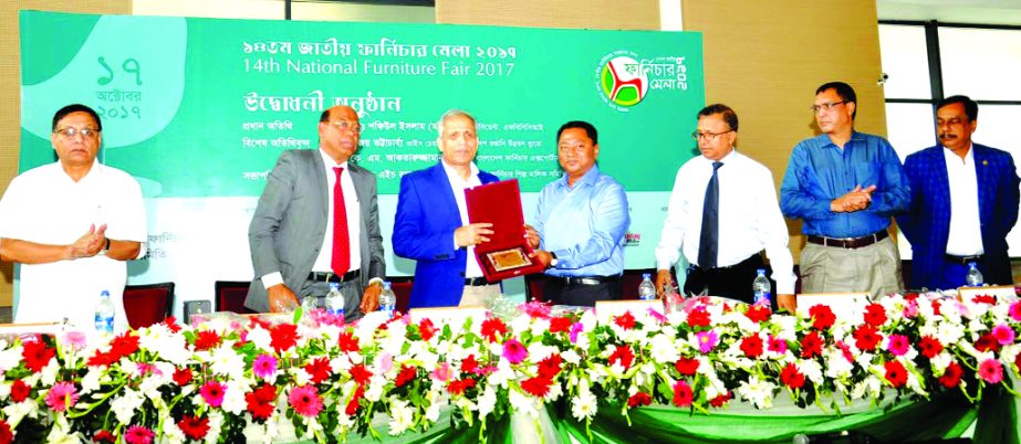 Md. Shafiul Islam, President of FBCCI, inaugurating the 5-day long 14th National Furniture Fair 2017 at a city convention centre on Tuesday. Bijoy Bhattacharya, Vice -Chairman of the Export Promotion Bureau (EPB), Selim H Rahman , Chairman of Bangladesh