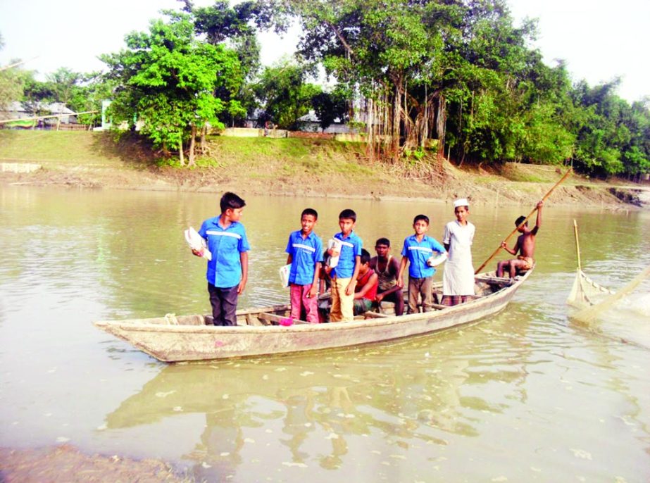 JAMALPUR: People of 30 villages at Melandah Upazila have been using boats to cross Katakhali River in absence of bridge . This snap was taken yesterday.