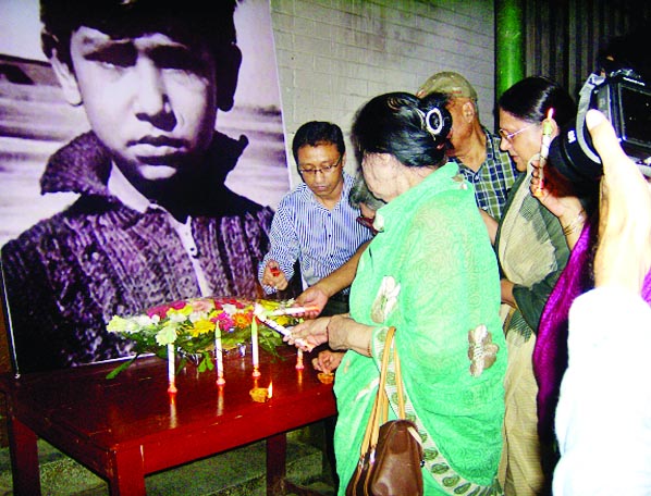 Participants at the candle-lit programme marking the 53rd birth anniversary of Sheikh Russell, yongest son of Father of the Nation Bangabandhu Sheikh Mujibur Rahman organised by University Laboratory Ex-Students Association (ULESA) on Wednesday on the pre