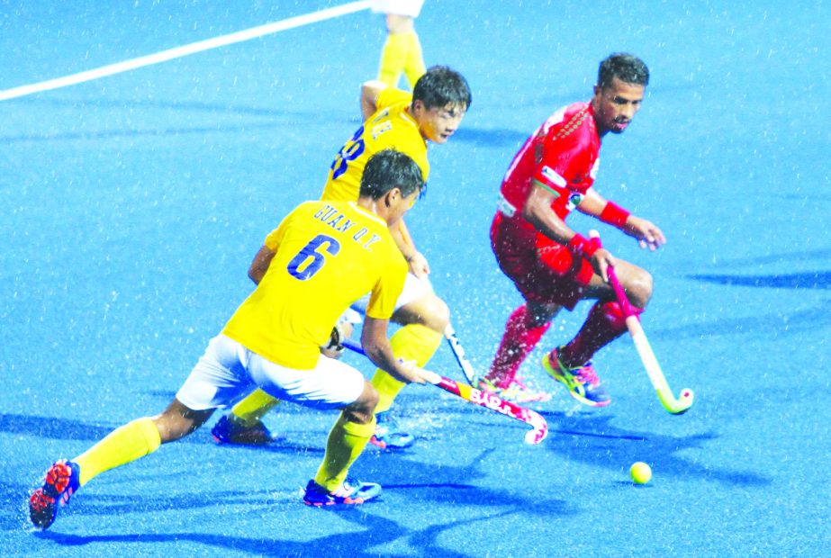 An action from the match of the Hero Asia Cup Hockey between Bangladesh and China at the Moulana Bhashani National Hockey Stadium on Thursday.