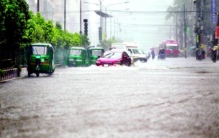 Incessant rains batter normal life in city and elsewhere in the country beginning from Thursday night that continued till writing this caption on Friday night. This photo was taken from Motijheel area.