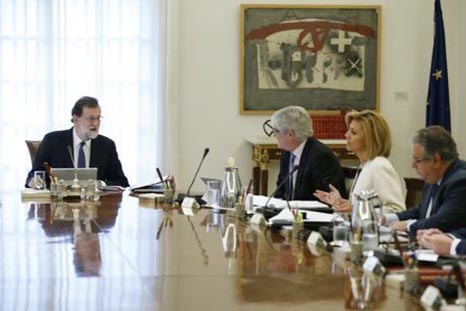 Spain's Prime Minister Mariano Rajoy heads a special cabinet meeting at the Moncloa Palace in Madrid, Spain on Saturday.