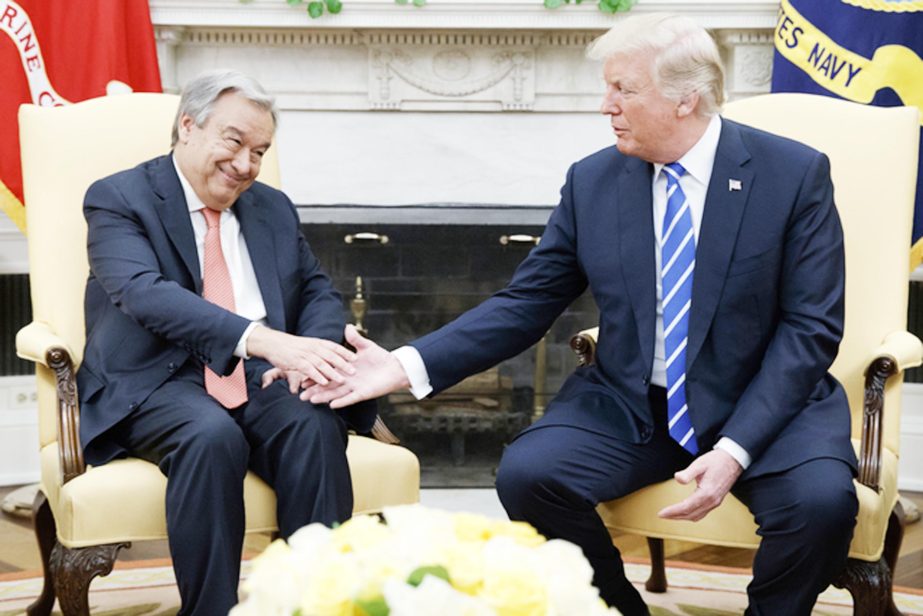 President Donald Trump shakes hands with UN Secretary General Antonio Guterres during a meeting in the Oval Office of the White House on Friday in Washington.