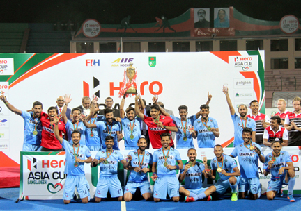Members of India, the champions of the 10th Hero Asia Cup Hockey with the guests pose for a photo session at the Moulana Bhashani National Hockey Stadium on Sunday.