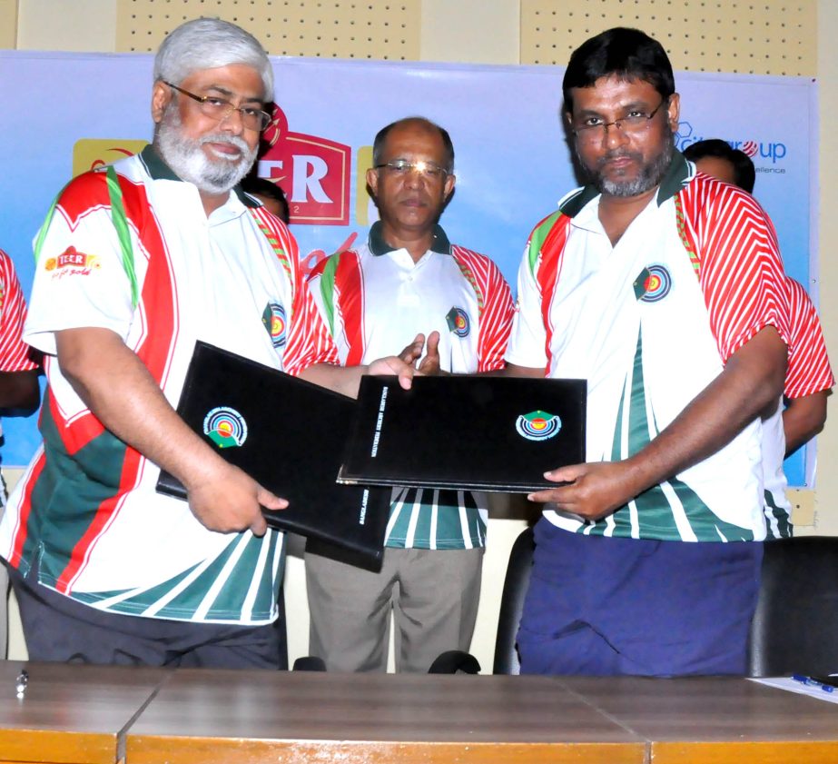 General Secretary of Bangladesh Archery Federation Kazi Razibuddin Ahmed Chapal (left) and Head of Marketing of City Group Shoaib Md Asaduzzaman exchanging papers after signed the deal on behalf of their respective organisations at the BOA auditorium on M