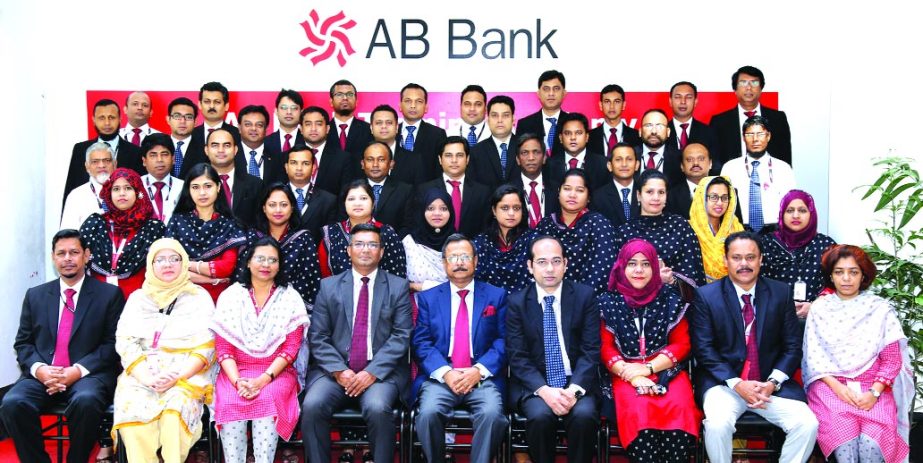 Sajjad Hussain, Deputy Managing Director of AB Bank Limited, poses with the participants of a 5 day long training program on "Banking Learning Modules, General Banking (Basic Level)" at the bank's Training Academy in the city recently. Senior officials