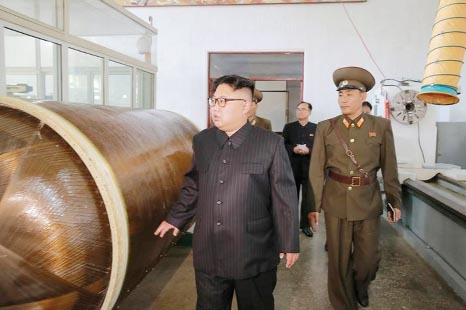 North Korean leader Kim Jong-Un looks on during a visit to the Chemical Material Institute of the Academy of Defense Science in this undated photo released by North Korea's Korean Central News Agency (KCNA) in Pyongyang..