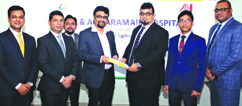 M Nazeem A Choudhury, Head of Consumer Banking of Eastern Bank Limited and Syed Sabbir Ahmed, Executive Director (Finance) of Al Haramain Hospital (Pvt.) Limited, Sylhet exchanging an agreement signing documents in the city recently. Under the deal, the w