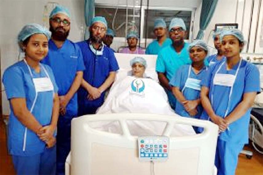 Doctors of the operation team of Chittagong Metropolitan Hospital seen with patient Khaleda Begum after first ever successful tumour surgery .