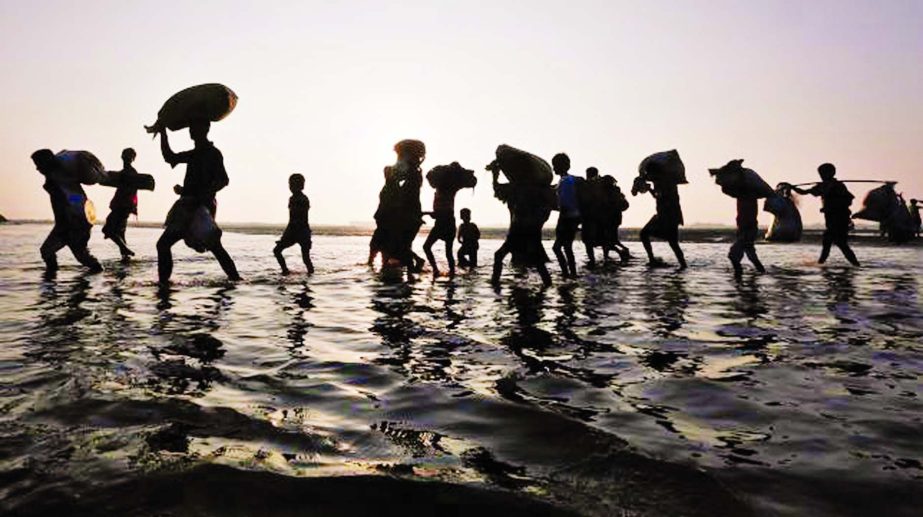 Exodus continues: Several Rohingya refugees still entering Bangladesh through crossing the Naf River. This photo was taken early morning of Wednesday.