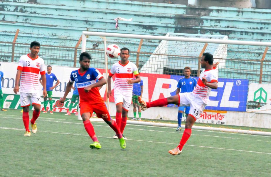 An action from the match of the Marcel Bangladesh Championship League Football between Bangladesh Police Football Club and Feni Soccer Club at the Bir Shreshtha Shaheed Sepoy Mohammad Mostafa Kamal Stadium in the city's Kamalapur on Wednesday. The match