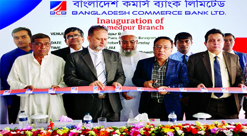Engr. Rashid Ahmed Chowdhury, Chairman, Board of Directors of Bangladesh Commerce Bank Limited, inaugurating its 54th Branch at Ahmedpur in Natore on Thursday. Humayun Boktheyar FCA, Audit Committee Chairman, Kazi Md. Rezaul Karim, DMD of the bank and loc