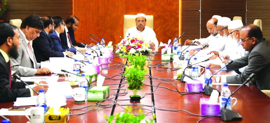 Hafez Md. Enayet Ullah, Chairman, Board of Directors of Al-Arafah Islami Bank Limited, presiding over its 597th EC Meeting at the bank's head office in the city on Thursday. Md. Habibur Rahman, Managing Director, Md. Harun-Ar-Rashid Khan, Nazmul Ahsan Kh