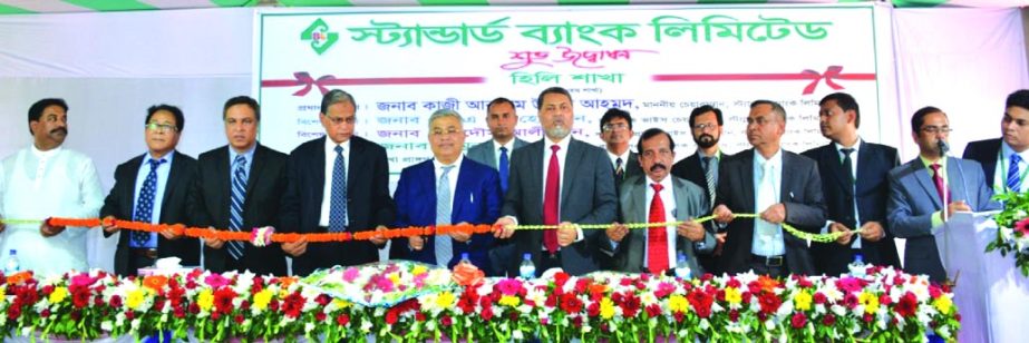 S A M Hossain, Vice Chairman of Standard Bank Limited, inaugurating the 116th branch at Hili Land Port, Hakimpur in Dinajpur recently. Mamun-Ur-Rashid, Managing Director of the bank presided over the ceremony. Former Vice Chairman of the bank Ferdous Ali