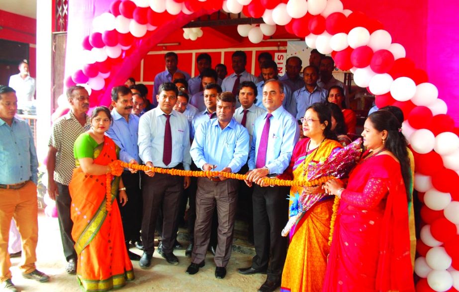 Mir Khairul Alam, District Commissioner of Dinajpur, inaugurating 4 day-long 'Singer Furniture Fair' at a local community center on Thursday. The fair will be open for everyday from 9 am to 8 pm. Senior officials of the company were also present.