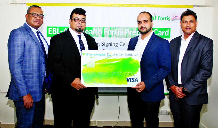 Nazeem A Choudhury, Head of Consumer Banking of Eastern Bank Limited and Saidul Amin, Director (Operations) of AFC Health Limited, inaugurating EBL- AFC Health Fortis Visa Prepaid card in the city recently. Senior officials from both the organizations we