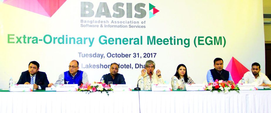 Mustafa Jabbar, President of Bangladesh Association of Software and Information (BASIS) Service, presiding over its Extra Ordinary General Meeting in the city on Tuesday. Senior Vice President Rasel T Ahmed, Vice President Farhana A Rahman, Director Utta