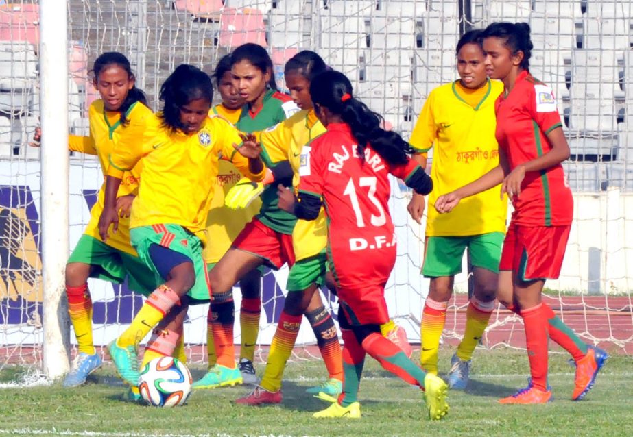 A moment of the match of the JFA Under-14 Women's National Football Championship between Thakurgaon district team and Rajbari district team at the Bangabandhu National Stadium on Thursday.