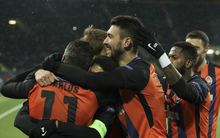 Shakhtar's players celebrate their goal during a Champions League Group F soccer match between Feyenoord and Shakhtar Donetsk at the Metalist Stadium in Kharkiv, Ukraine on Wednesday.