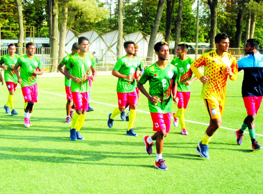 Members of Bangladesh Under-19 National Football team during their practice session at Outer Ground of National Stadium of Tajikistan on Friday.