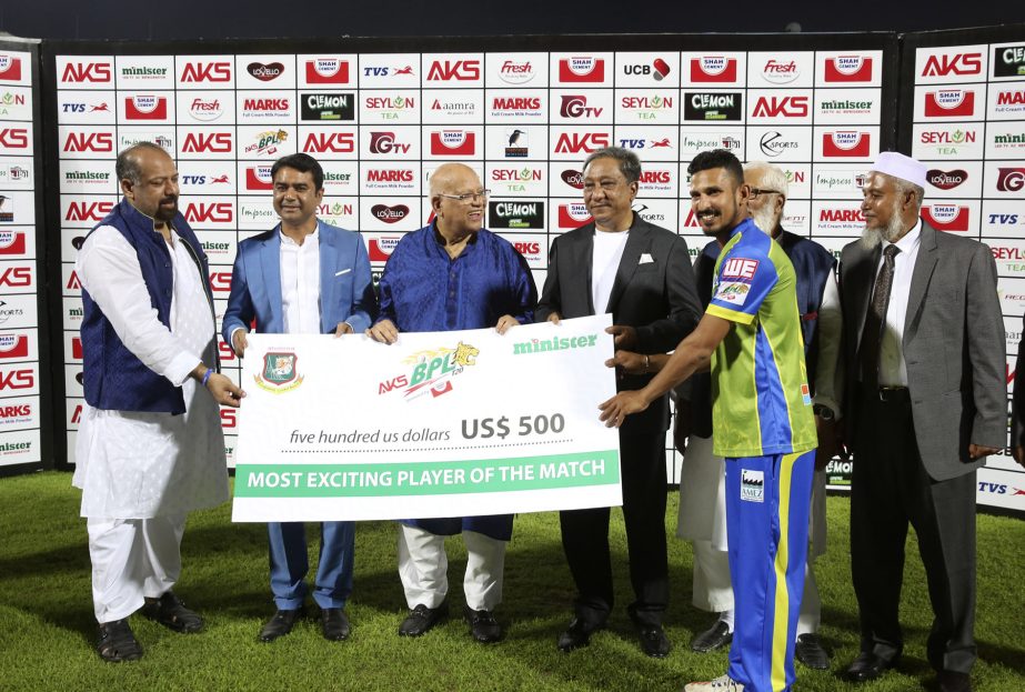 Captain of Sylhet Sixers Nasir Hossain receiving the award of Most Exciting Player of the Match from Minister for Finance AMA Muhith after the opening match of the AKS BPL Twenty20 Cricket between Sylhet Sixers and Dhaka Dynamites at Sylhet International